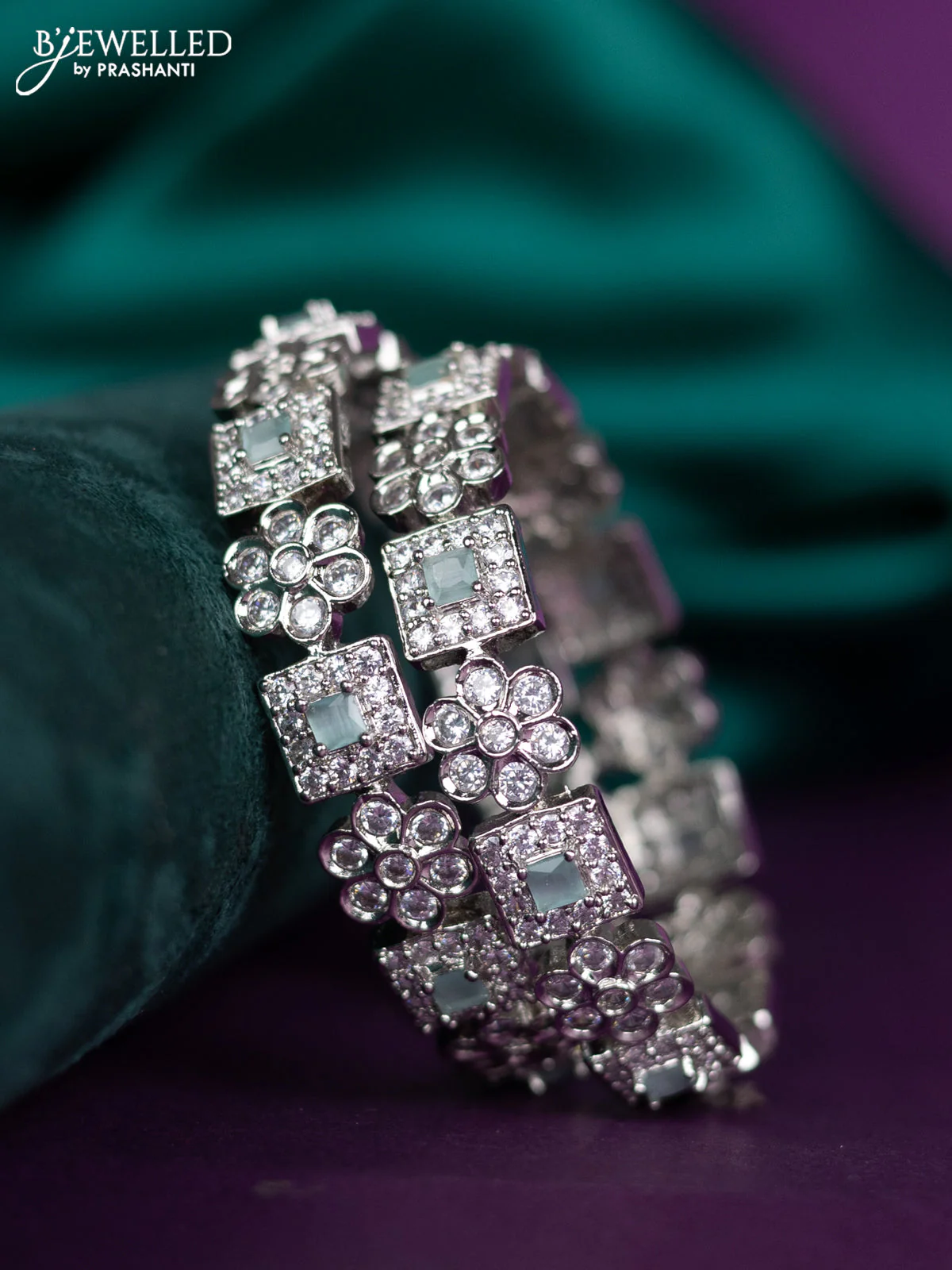 zircon bangle floral design with mint green and cz stones