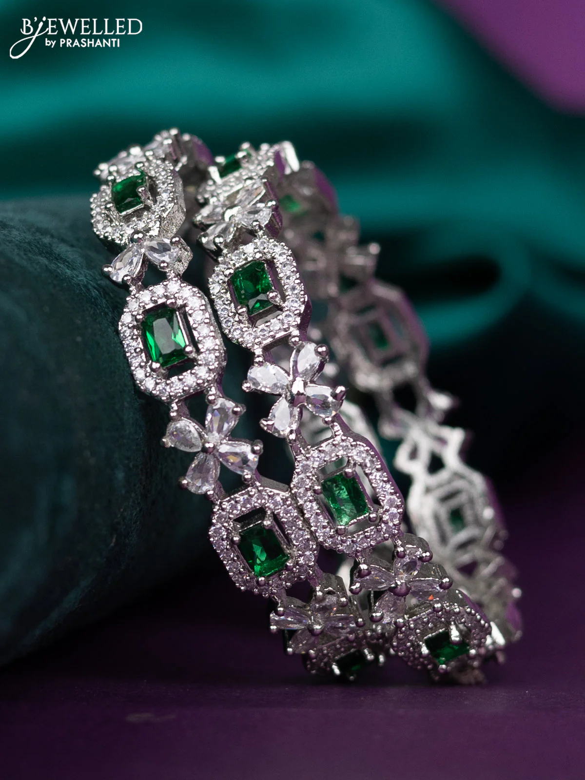 zircon bangle floral design with emerald and cz stones