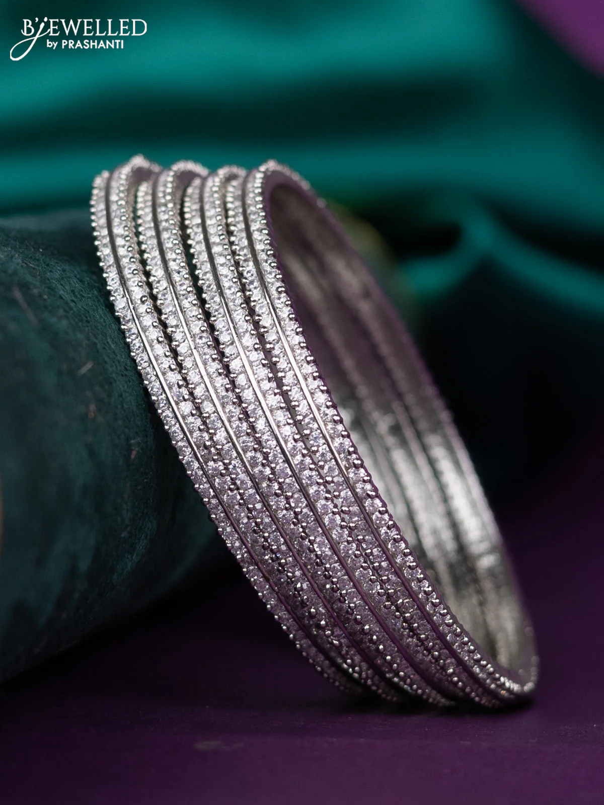 zircon bangle with cz stones