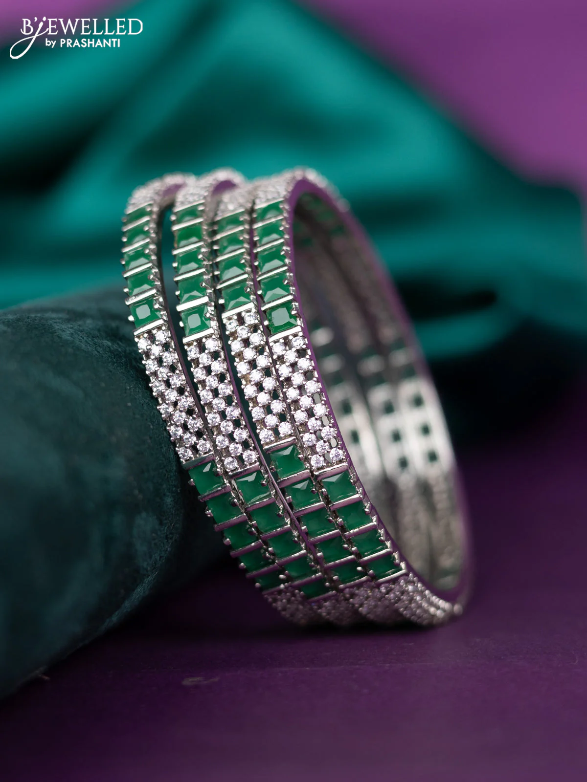 zircon bangle with emerald and cz stones