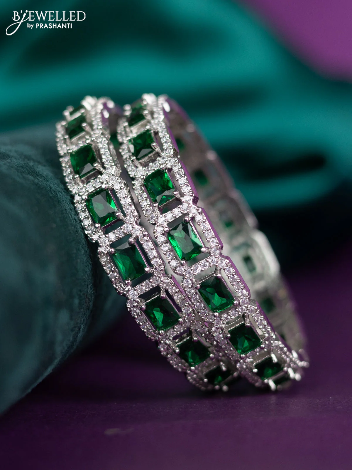zircon bangle with emerald and cz stones