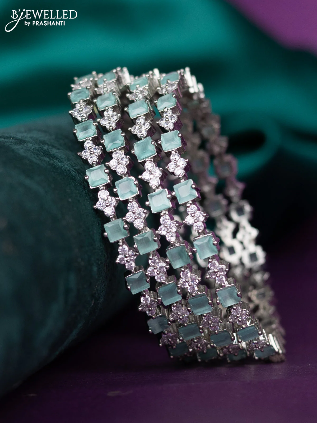 zircon bangle with pastel blue cz stones