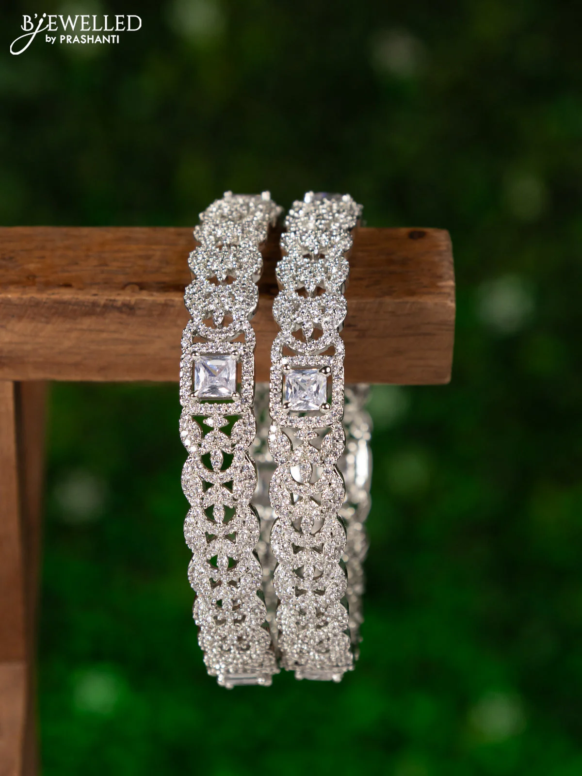 Zircon bangles with cz stones