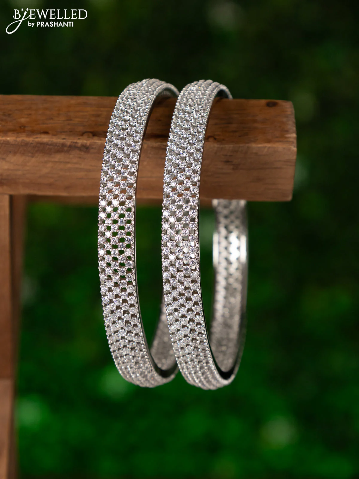 Zircon bangles with cz stones