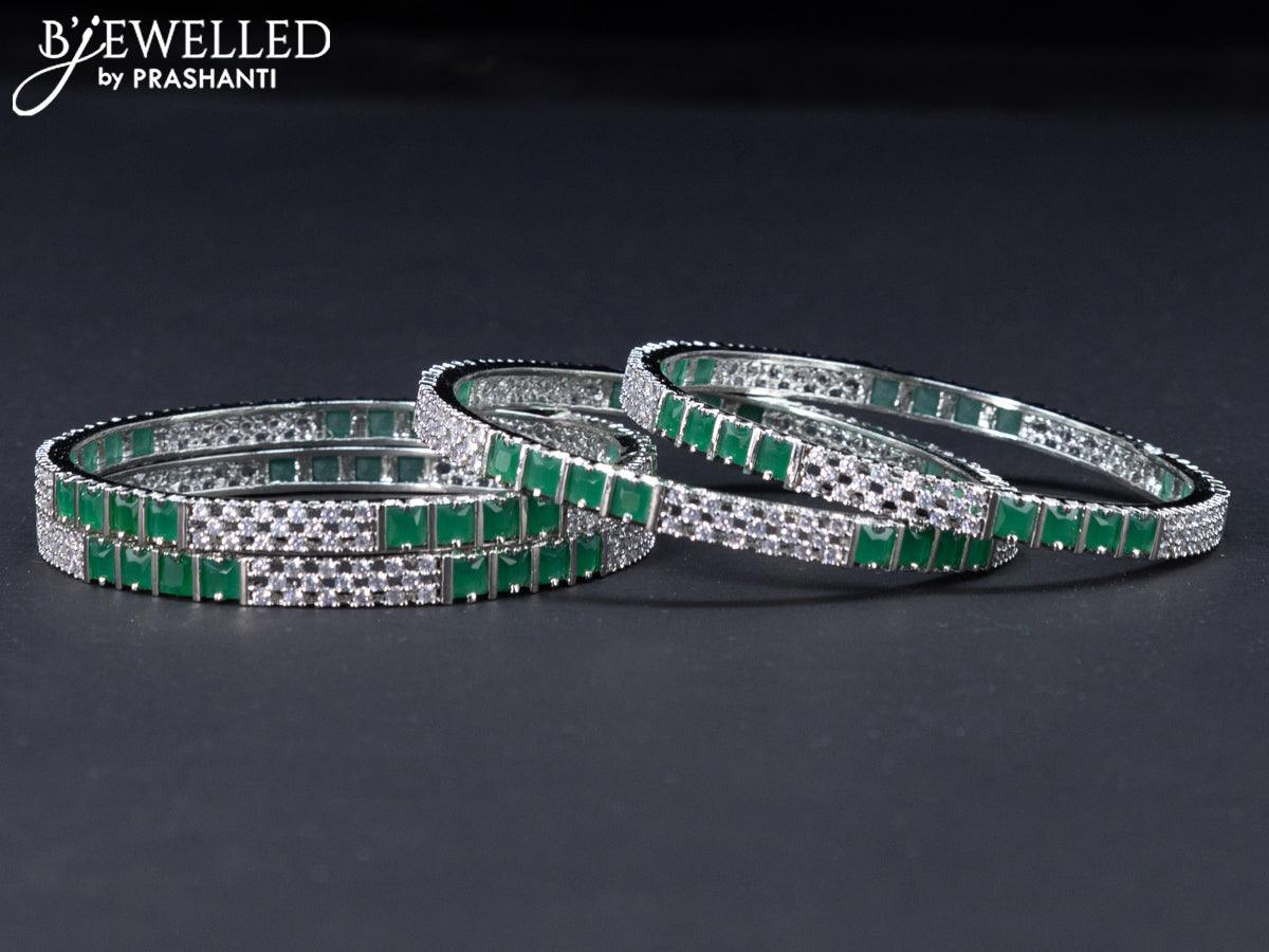 Zircon bangles with emerald and cz stones