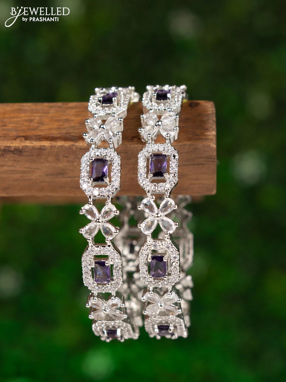 Zircon bangles with violet and cz stones