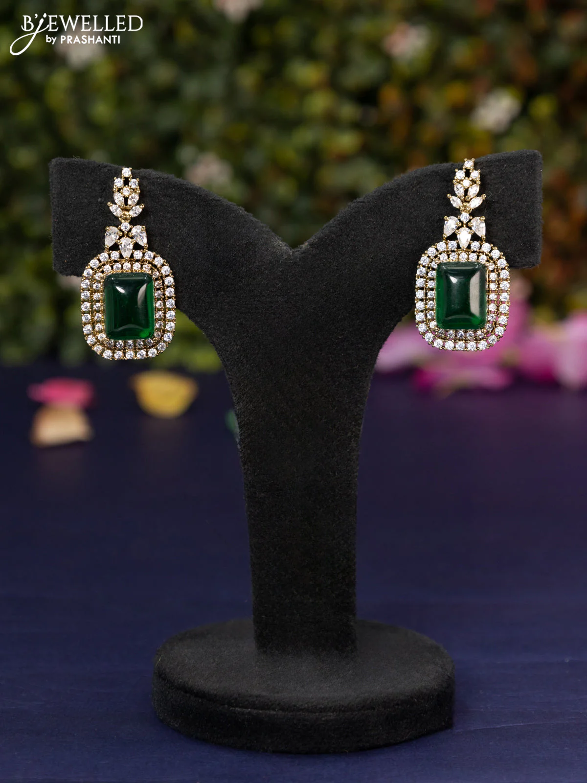 Zircon earring with emerald and cz stones
