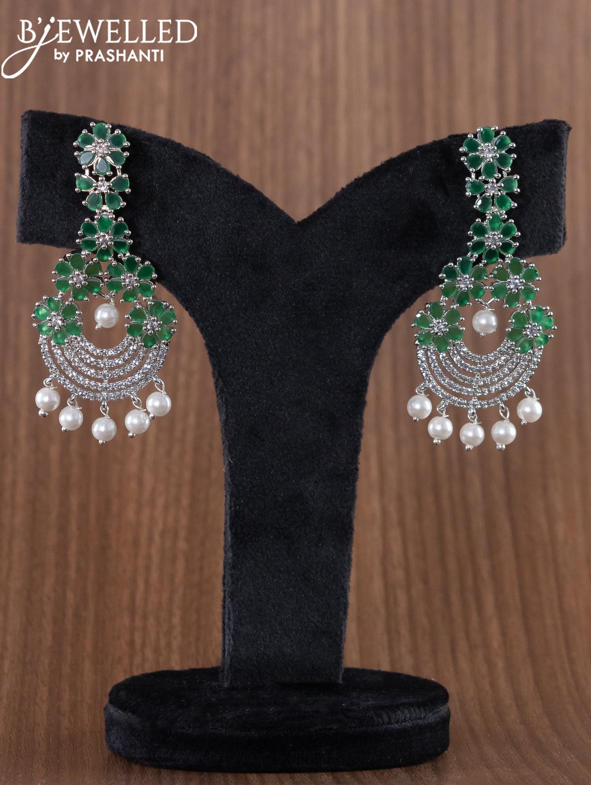 Zircon earrings floral design with emerald and cz stones