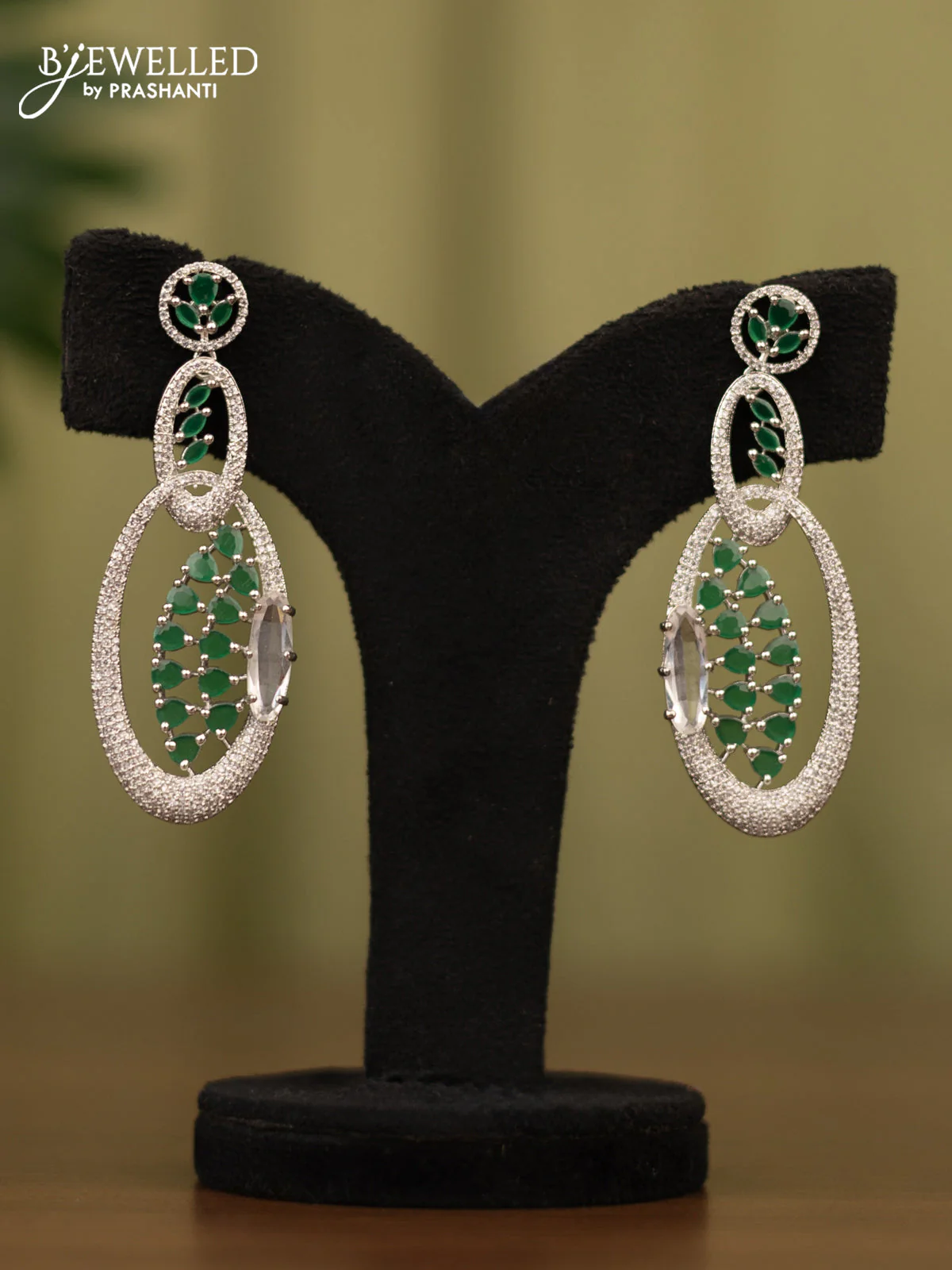 Zircon earrings with emerald andcz stones
