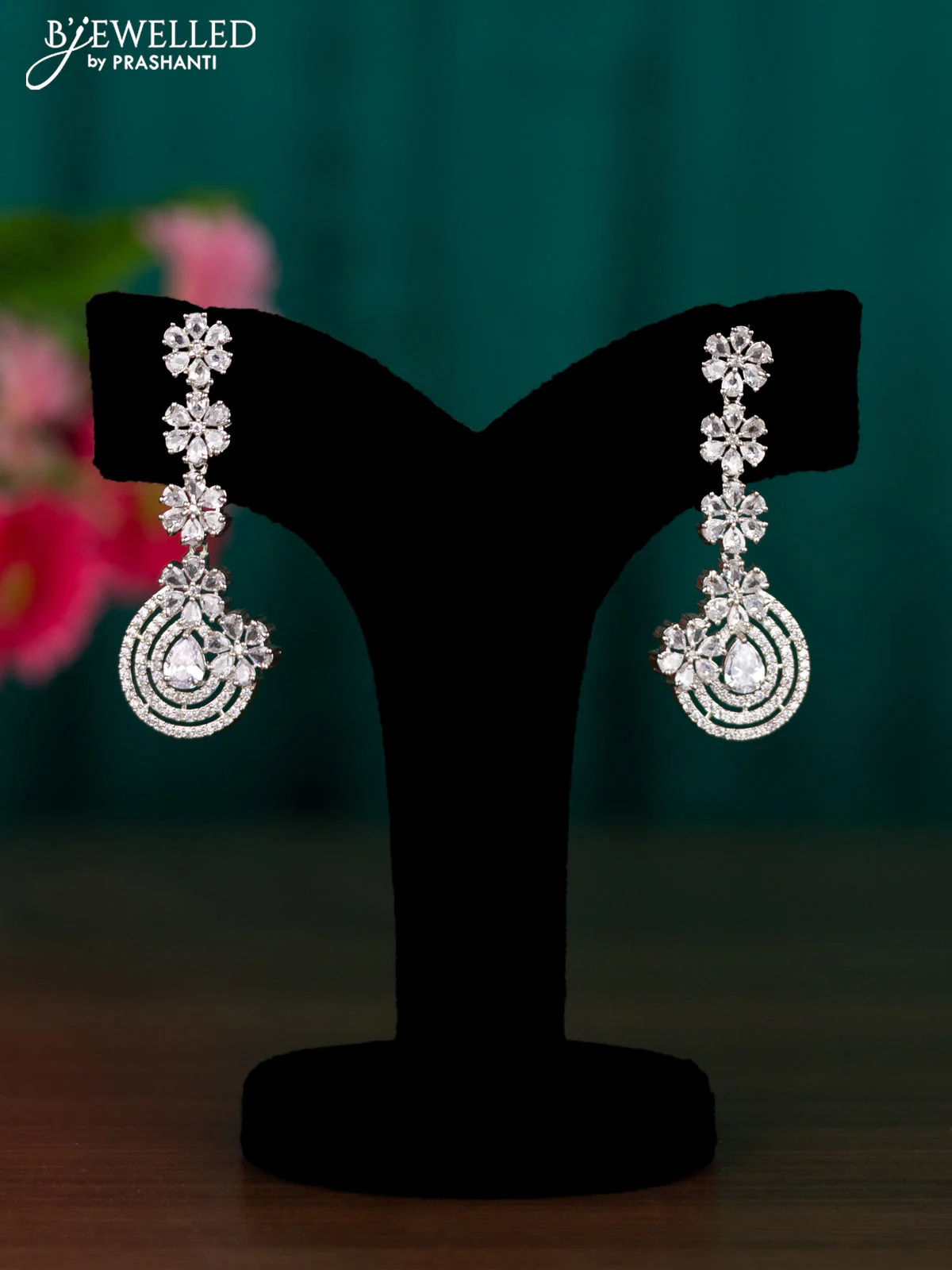 Zircon floral design earrings with cz stones
