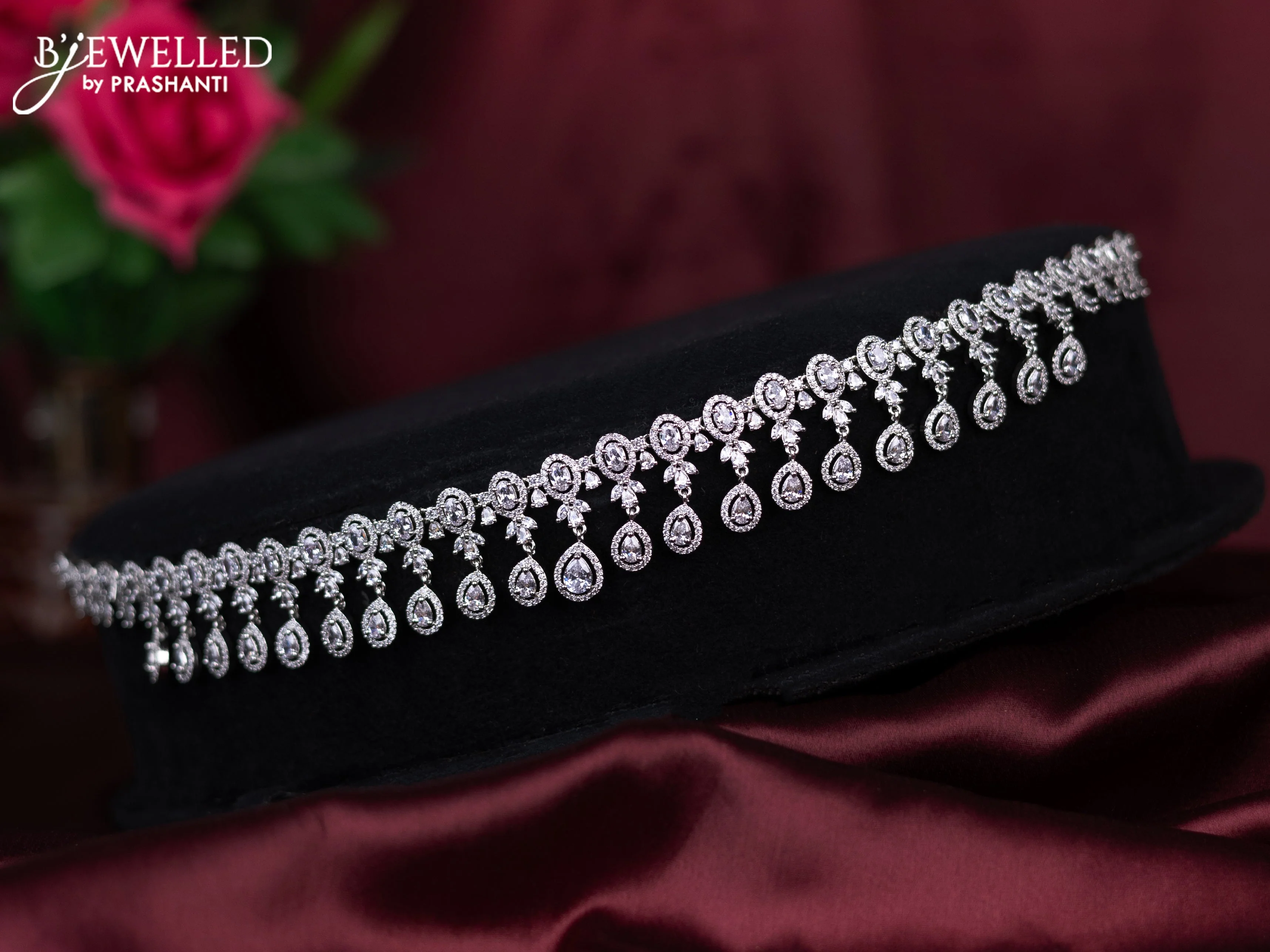 Zircon hip chain with cz stones