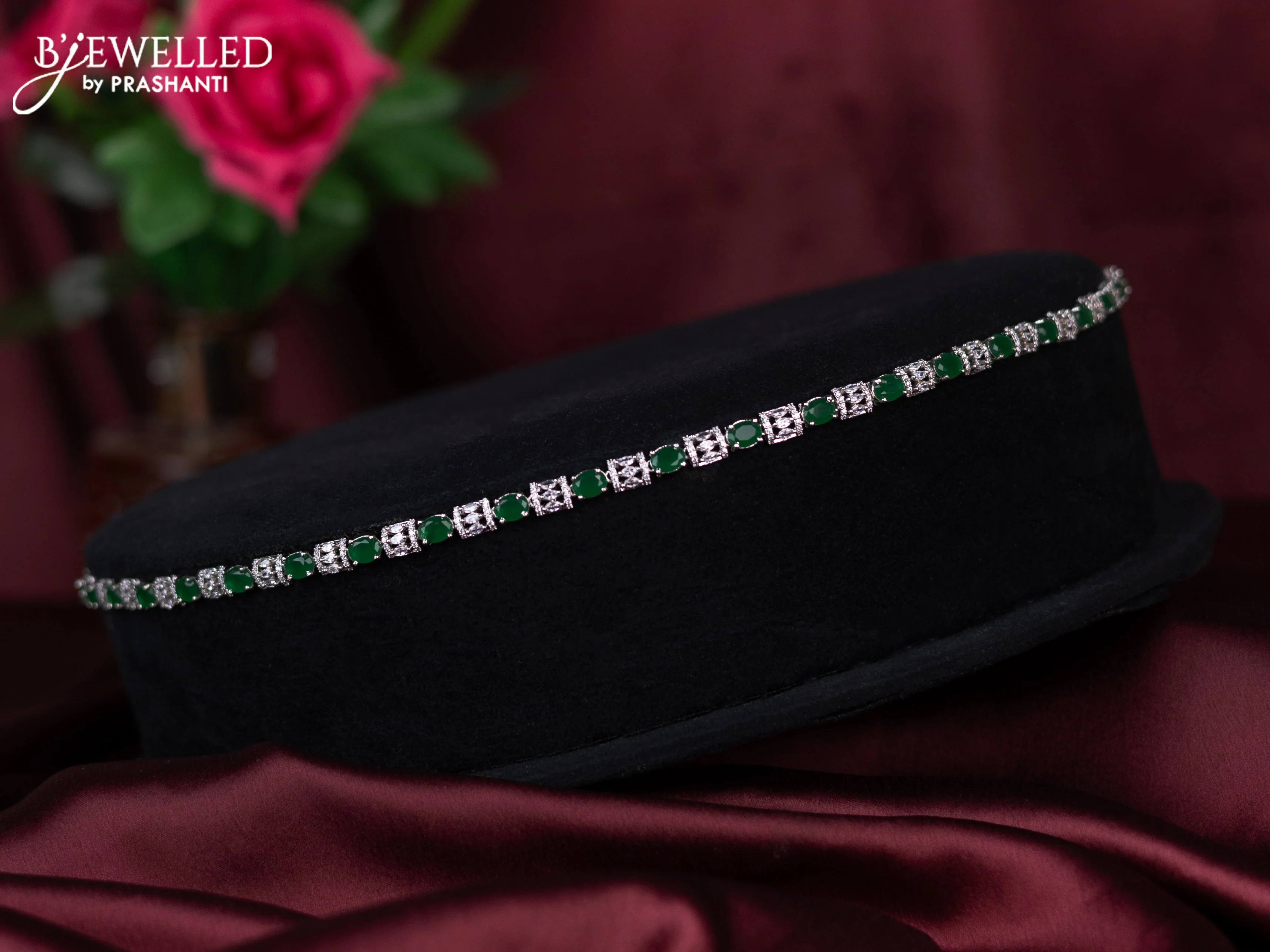 Zircon hip chain with emerald and cz stones