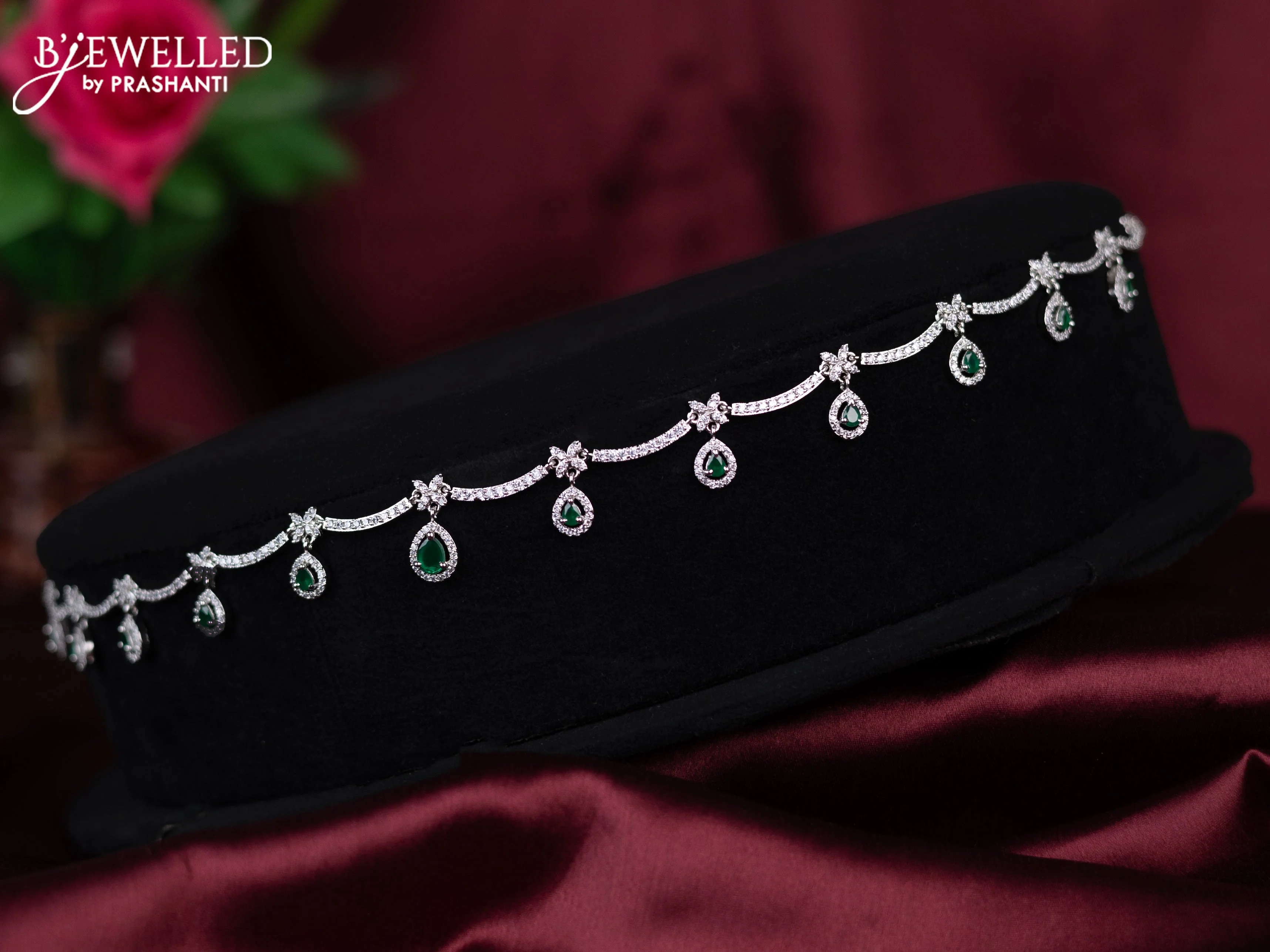 Zircon hip chain with emerald and cz stones