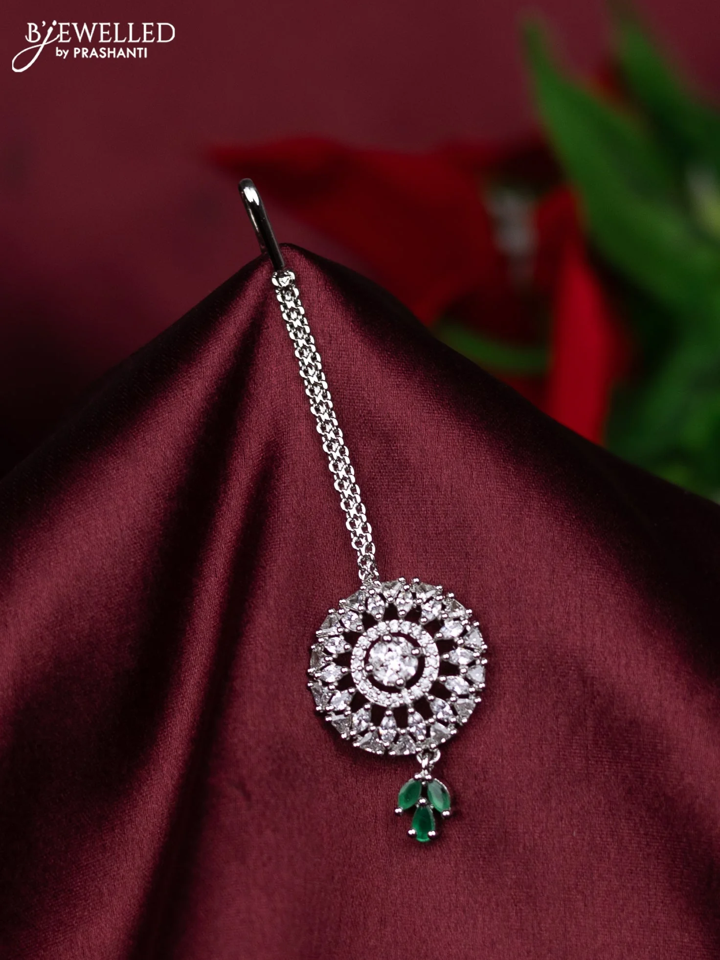 Zircon maang tikka with emerald & cz stones and hanings