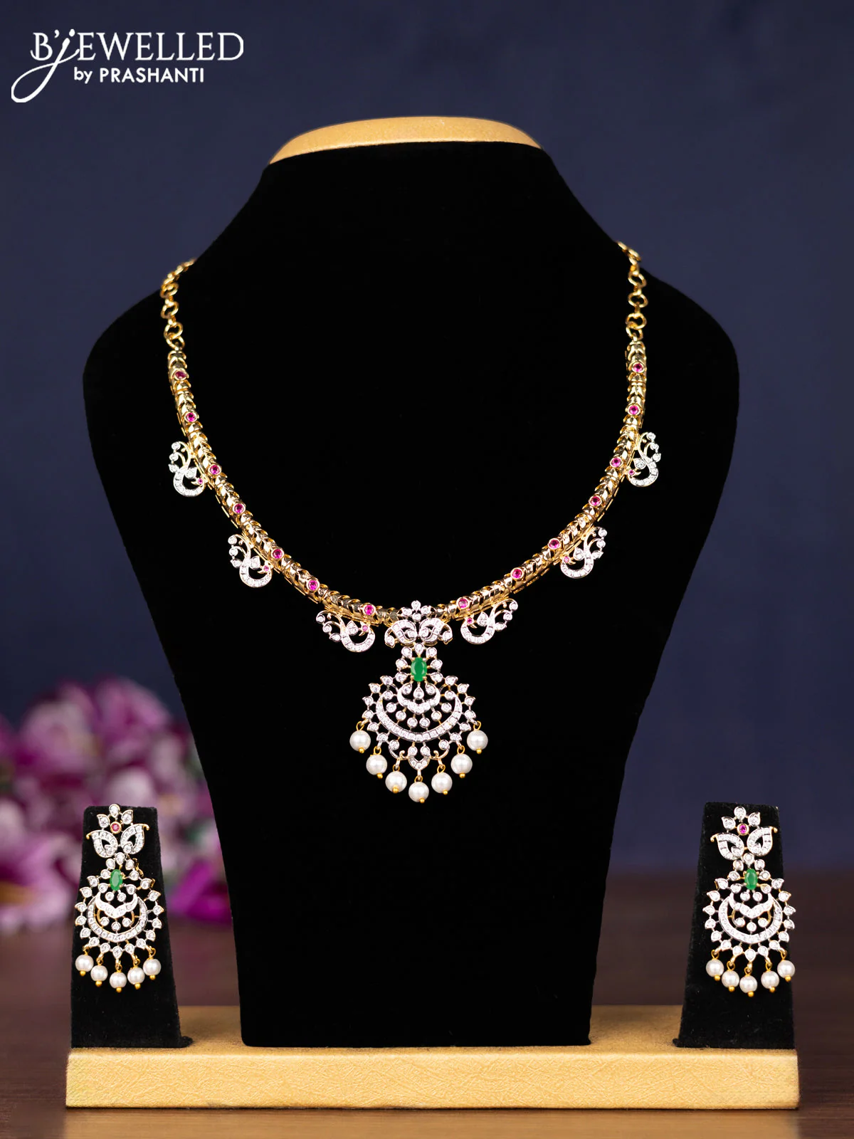 Zircon necklace with kemp & cz stones and pearl hangings in gold finish